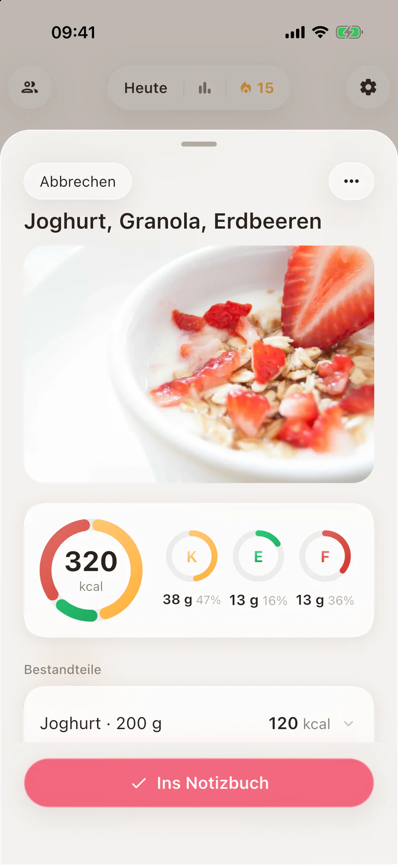Ein Foto einer Schale Joghurt mit Müsli und Erdbeeren, darunter die Schätzung von 320 kcal